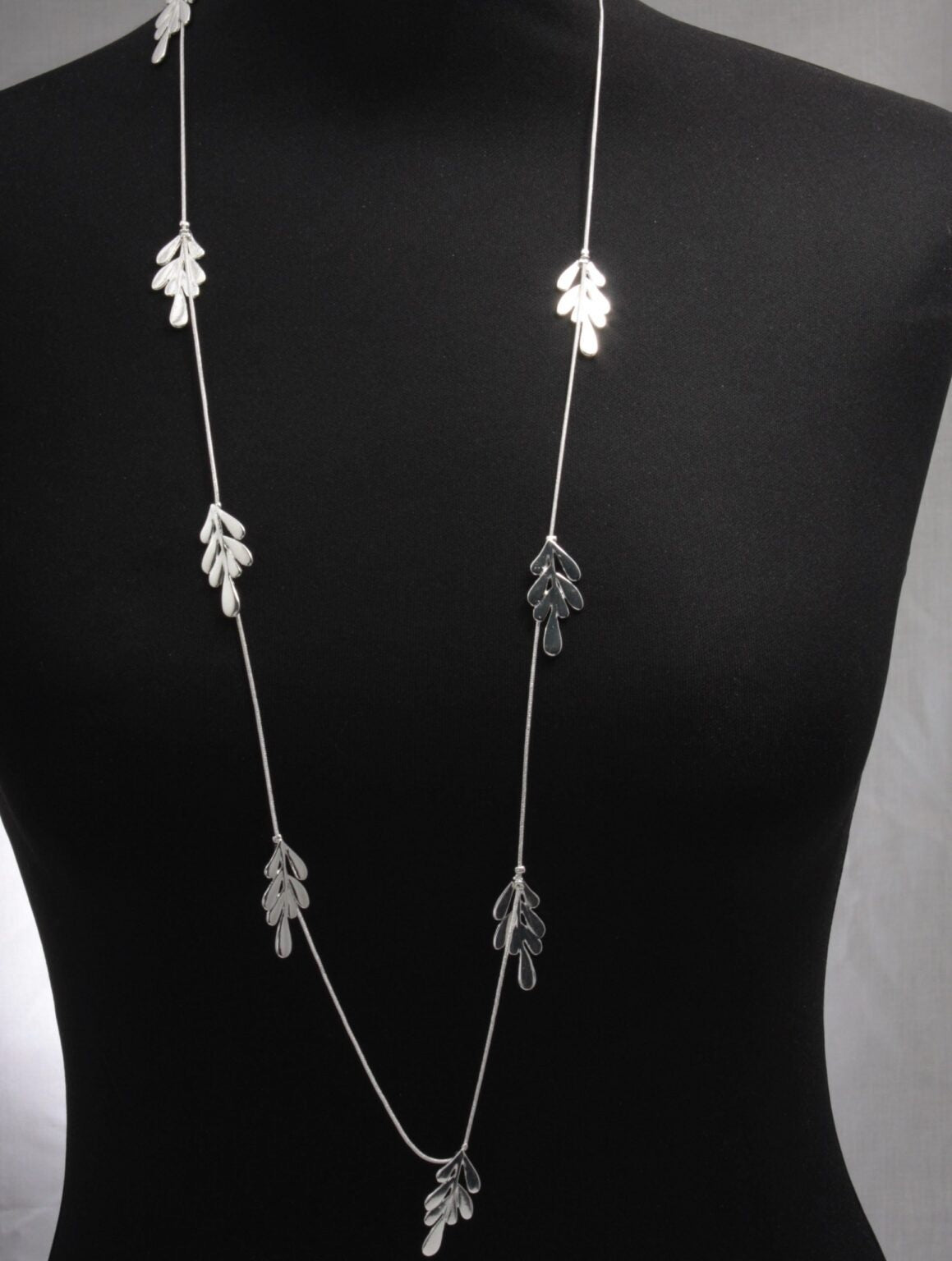 Long Cascading Silver Leaves Repeat Necklace