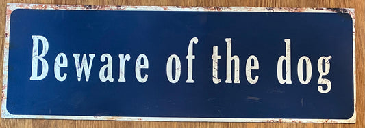 “Beware of the dog” metal sign