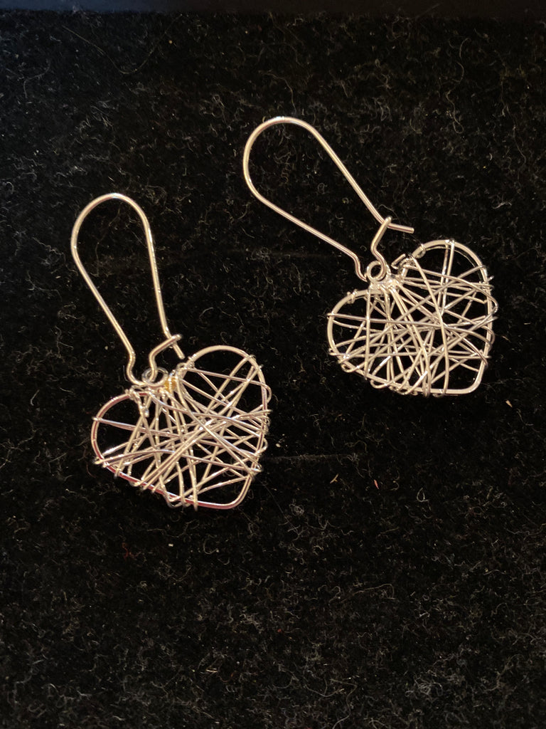 Silver plate wired heart design earrings with closed hook fixing.